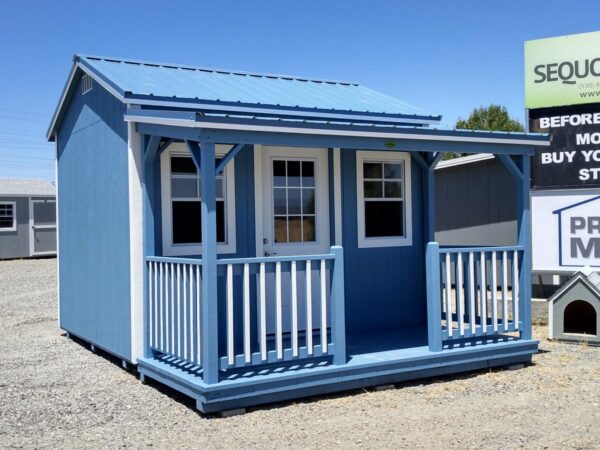 Blue Cottage Shed with porch and railing